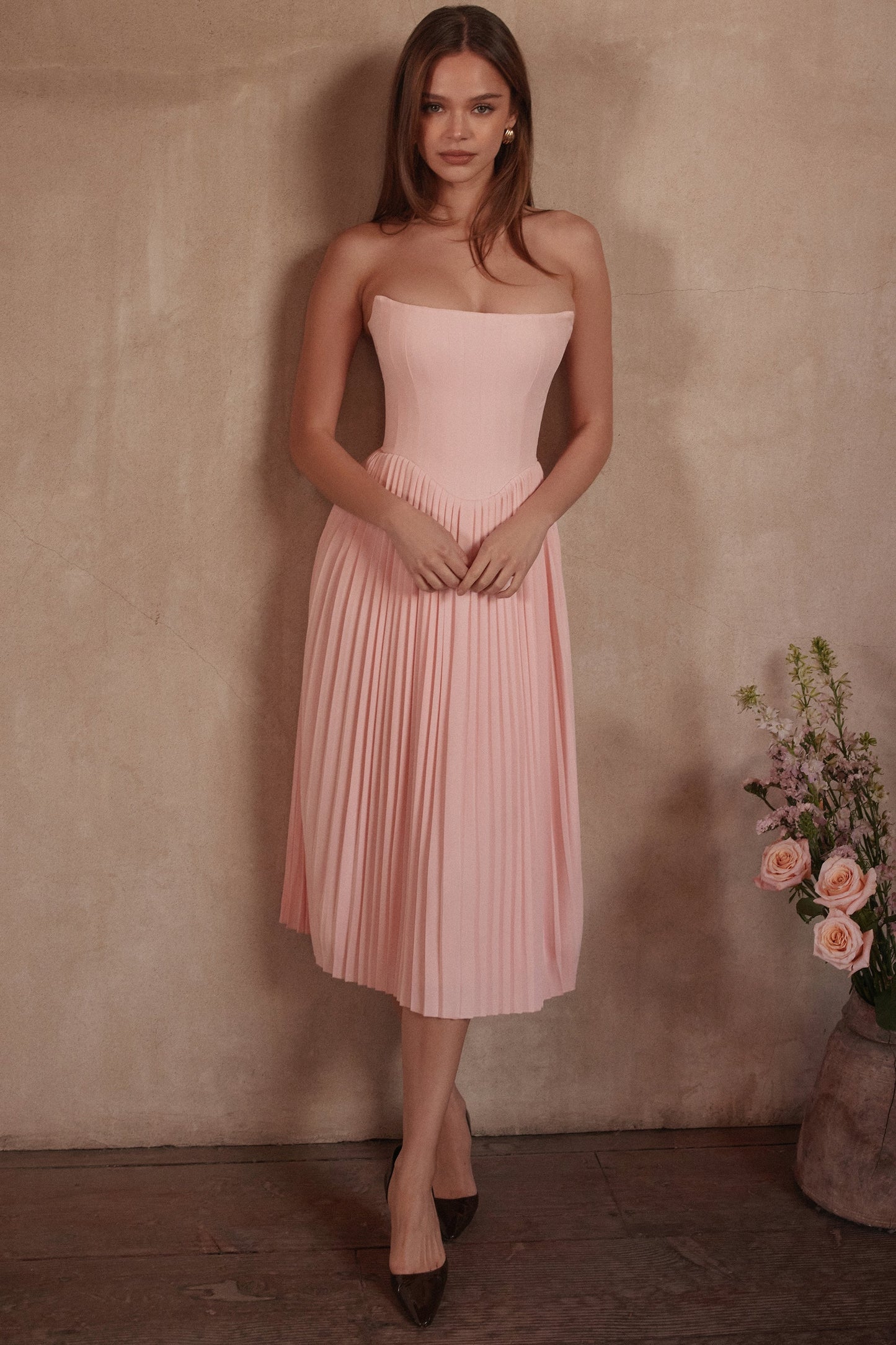 pink pleated midi corset dress