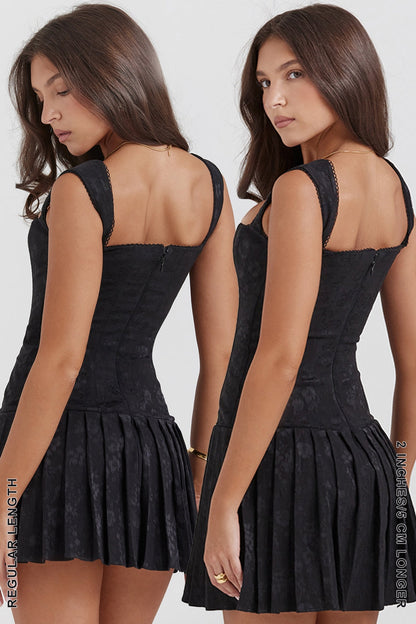 black pleated mini dress