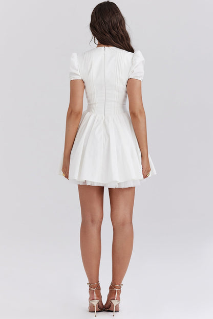 white pleated cotton mini dress